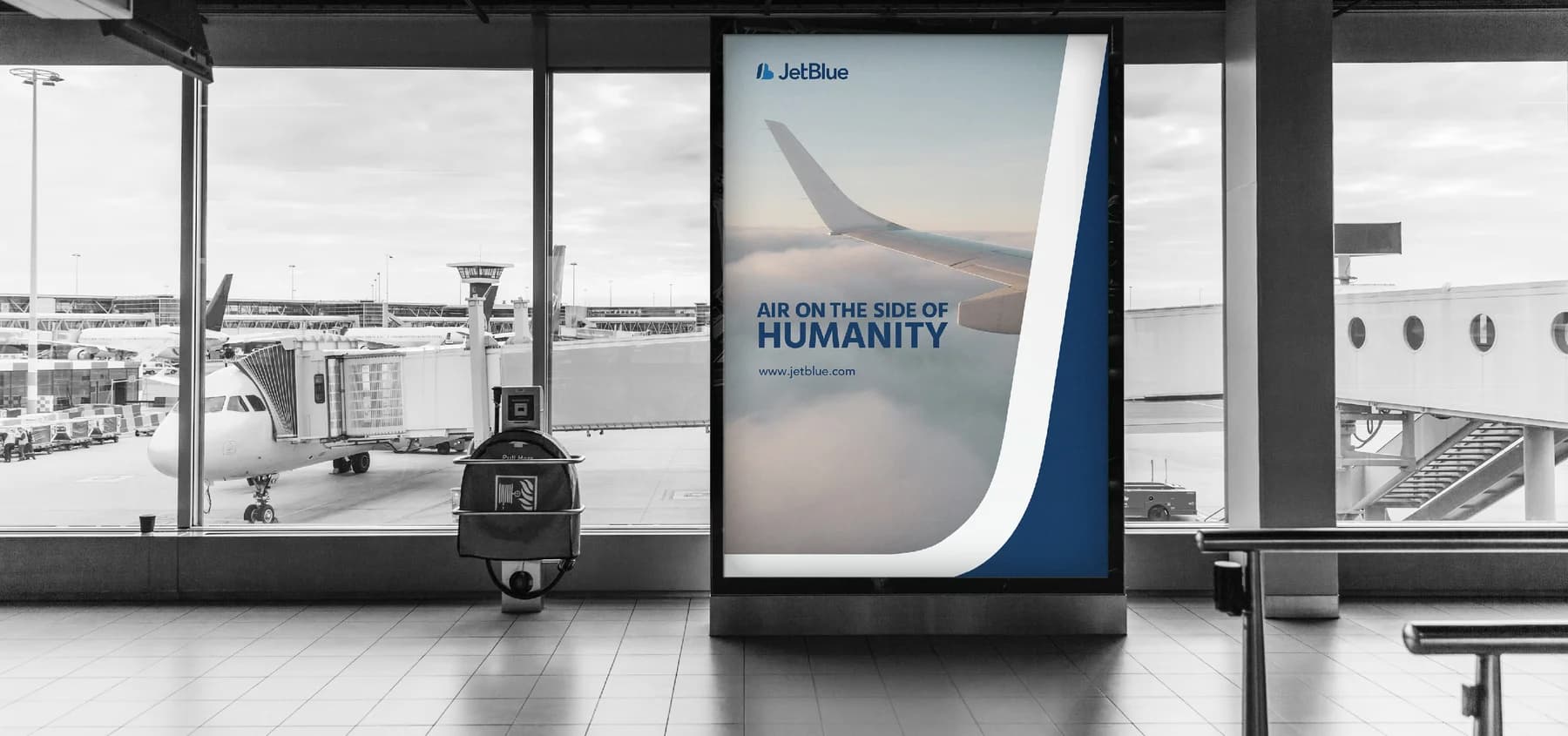 JetBlue campaign poster at the airport