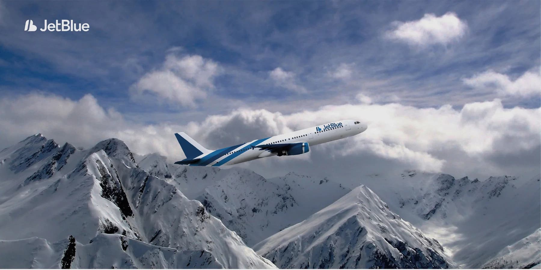 JetBlue aircraft above snowy mountains
